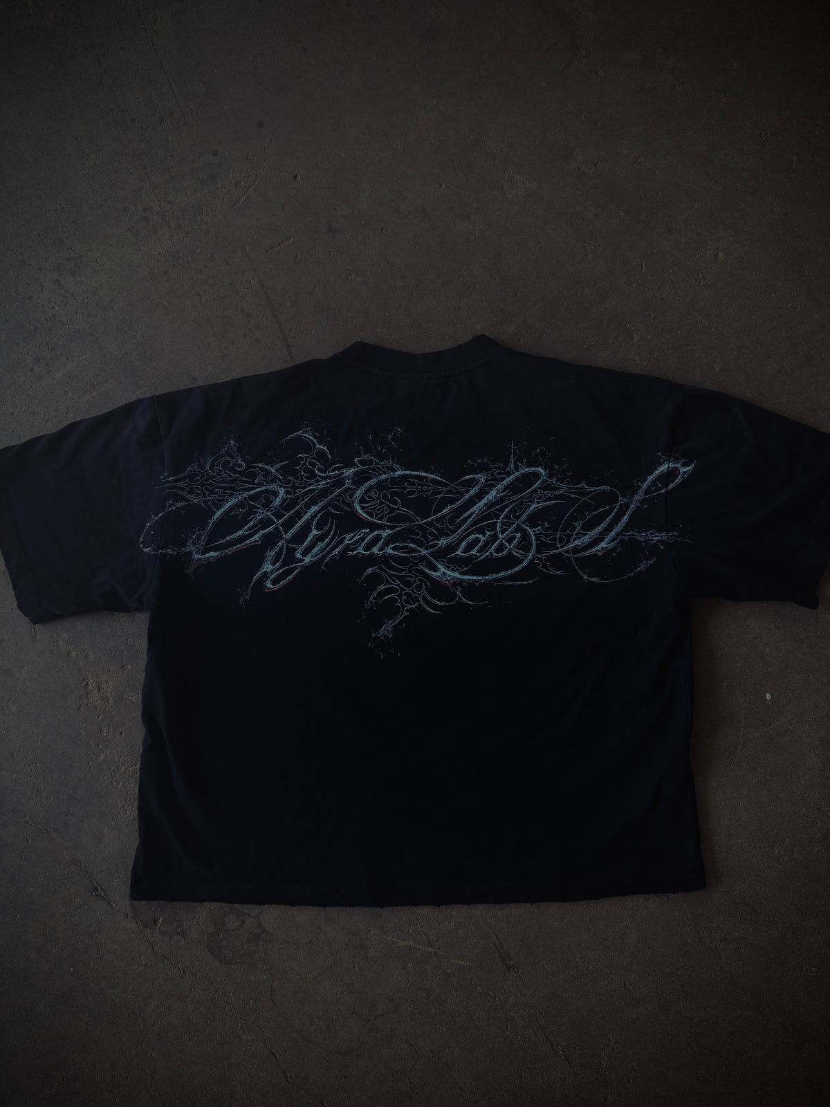 Back of the black VESSEL Pump Cover with AYRA script